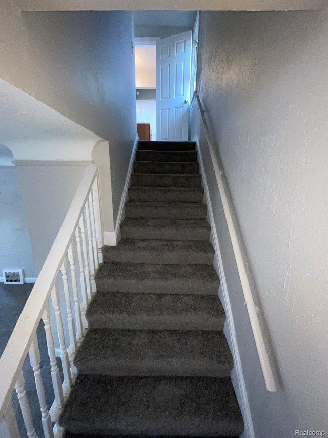 19254 Keystone St, Detroit, MI 48234 - staircase with baseboards