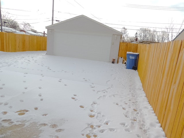 view of snow covered garage