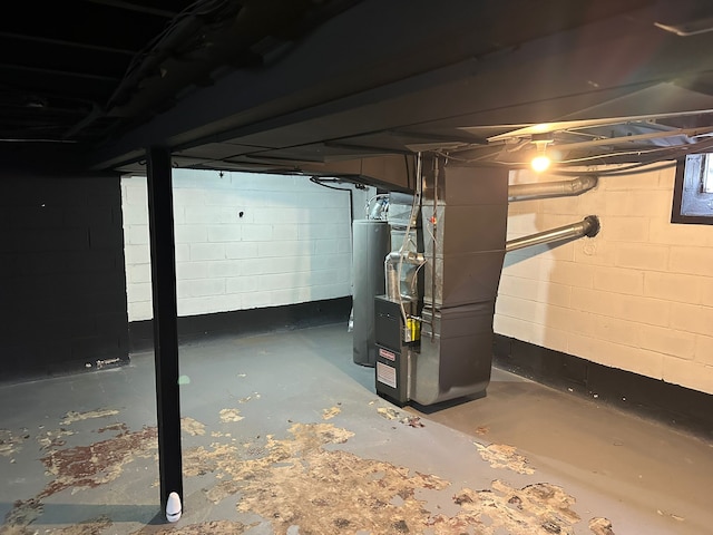 basement with heating unit and water heater