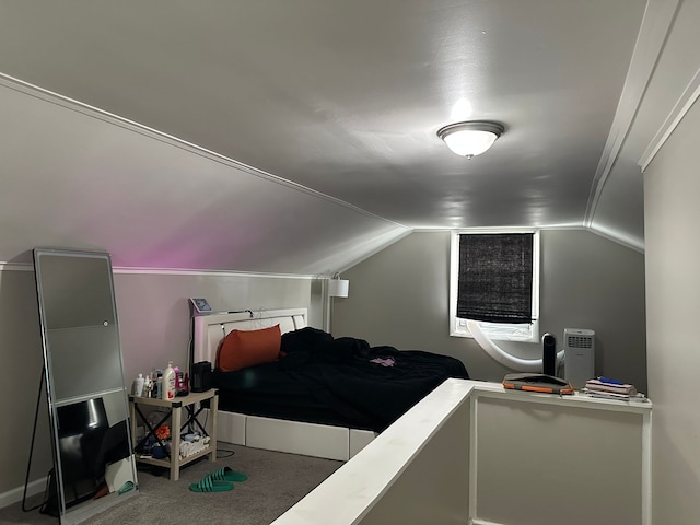 carpeted bedroom featuring vaulted ceiling