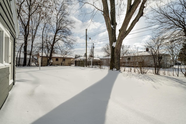 view of snowy yard