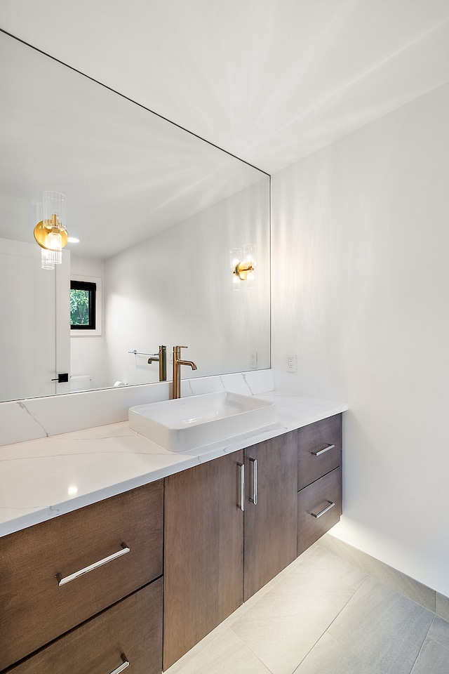 bathroom featuring vanity and tile patterned flooring