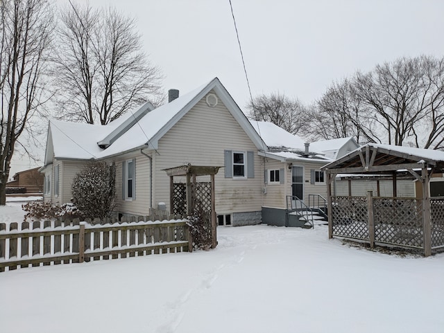 view of snow covered property