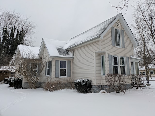 view of snow covered property