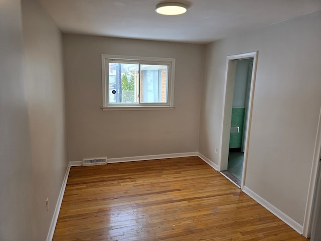 empty room featuring light hardwood / wood-style floors