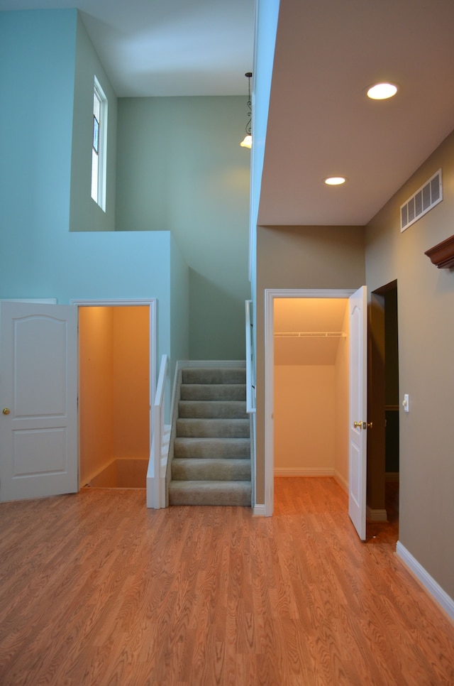 stairway with wood-type flooring