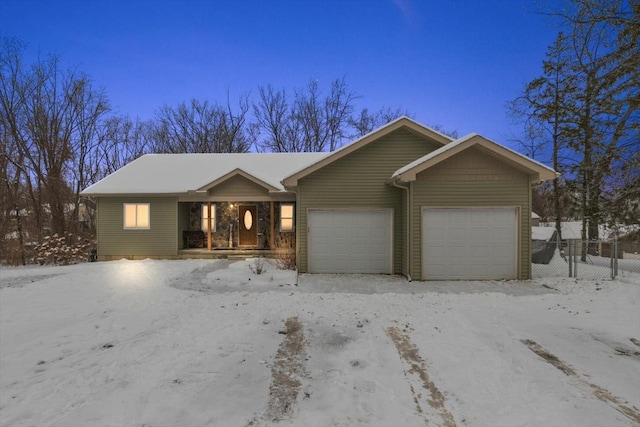 single story home featuring a garage