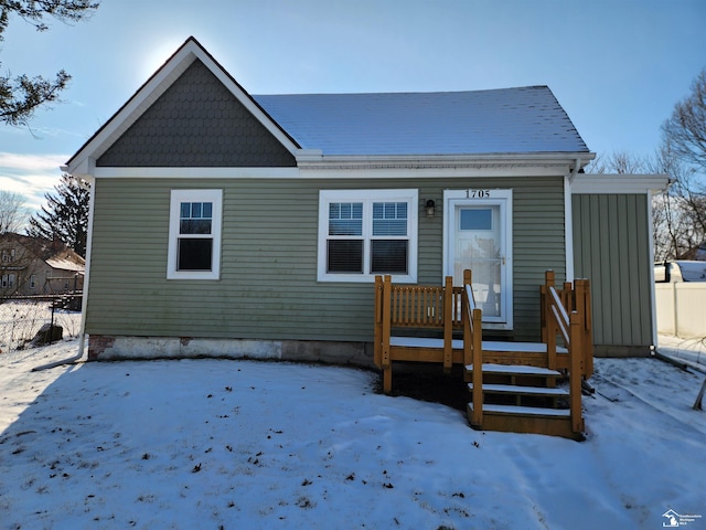 view of snow covered house