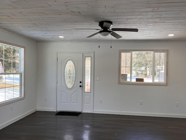 foyer entrance with ceiling fan, dark wood-type flooring, and wood ceiling