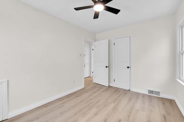 unfurnished bedroom featuring light hardwood / wood-style floors and ceiling fan