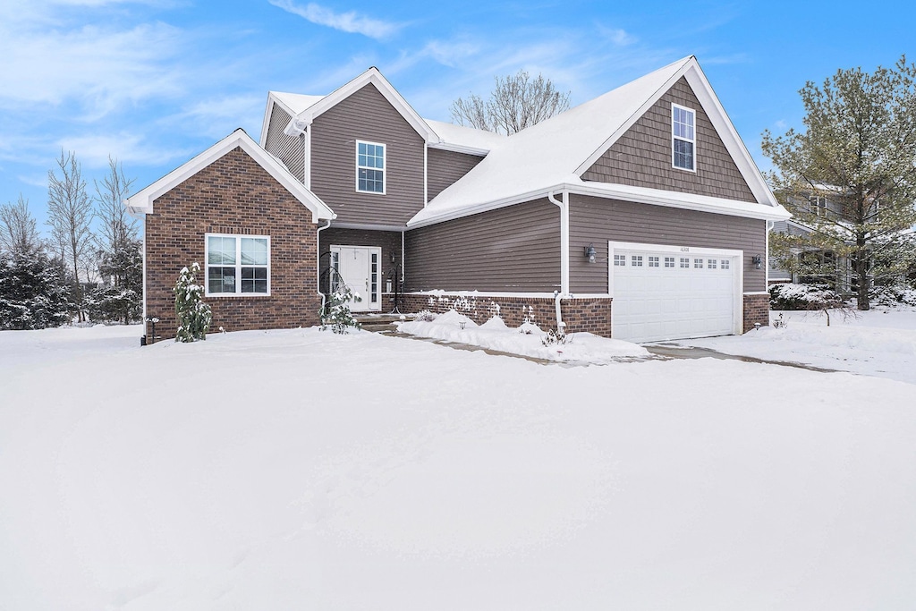 craftsman house with a garage