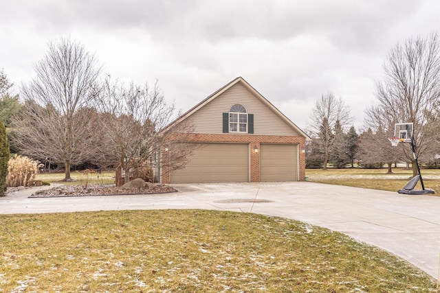 view of property exterior featuring a garage and a yard