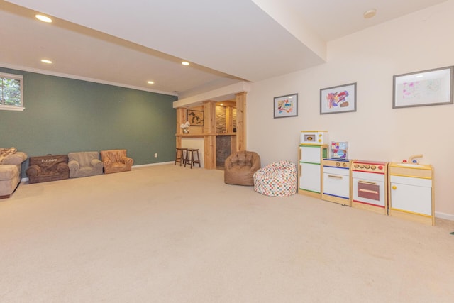 recreation room with carpet flooring