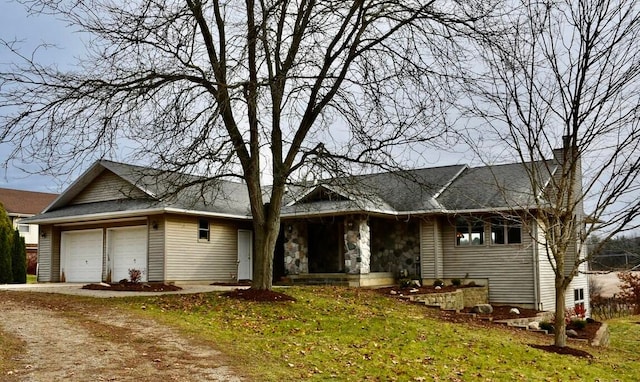 ranch-style home with a garage