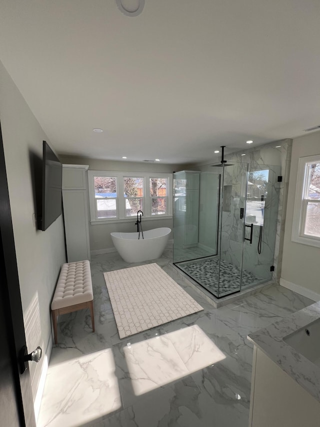 bathroom featuring vanity and plus walk in shower