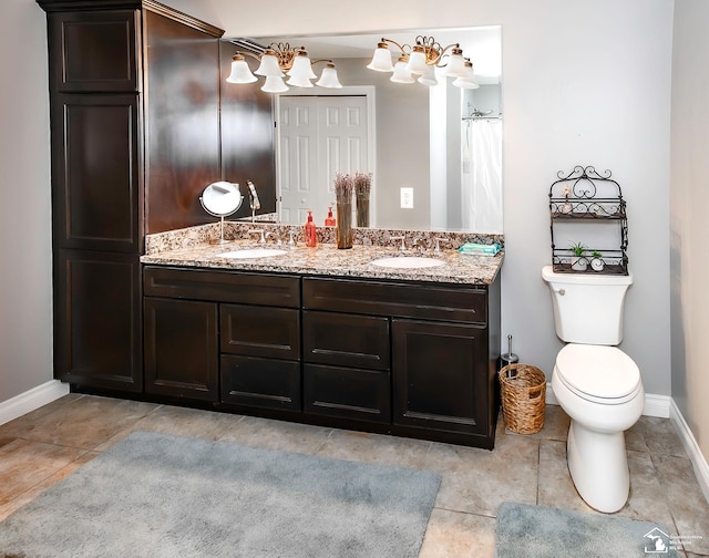 bathroom with vanity, toilet, tile patterned flooring, and a shower with shower curtain