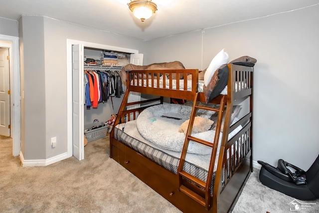 carpeted bedroom with a closet