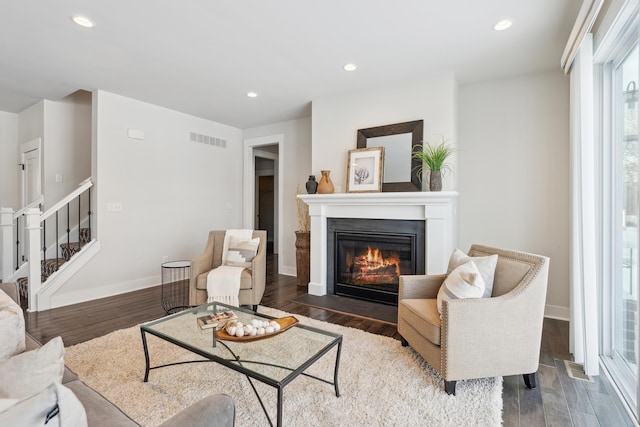 living room with dark wood-type flooring