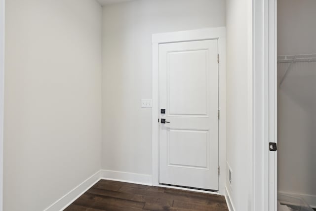 doorway to outside with dark hardwood / wood-style floors