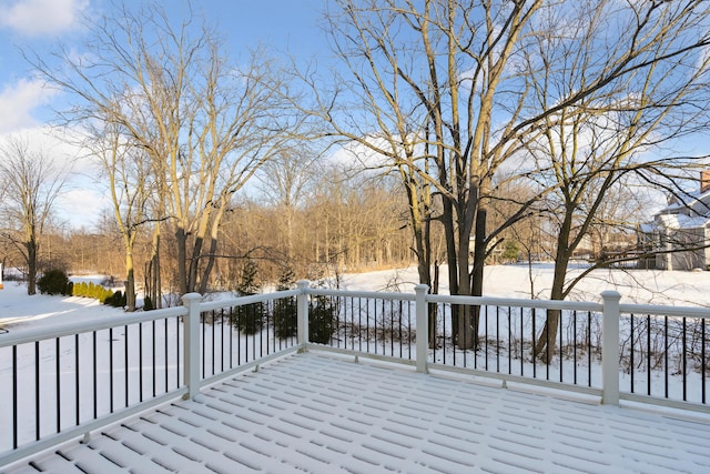 view of snow covered deck