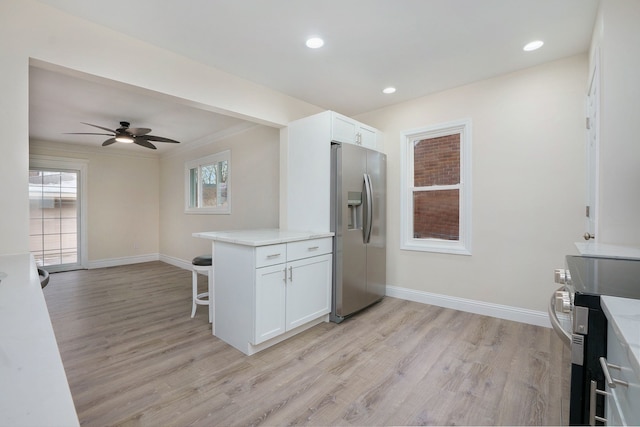 kitchen with white cabinetry, stainless steel refrigerator with ice dispenser, and light hardwood / wood-style floors