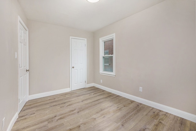 empty room featuring light hardwood / wood-style floors