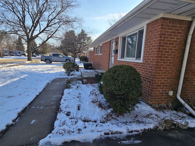 view of snow covered property