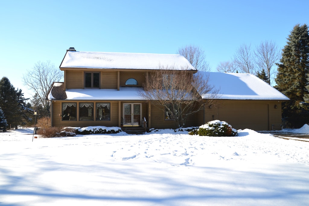 view of front of home featuring a garage