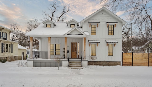 modern farmhouse style home with covered porch