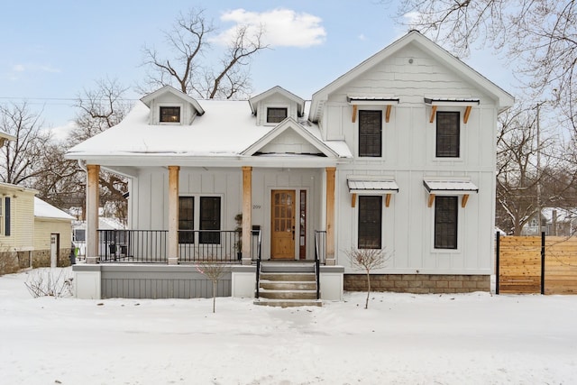 modern farmhouse style home with a porch