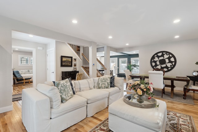 living room with light hardwood / wood-style flooring