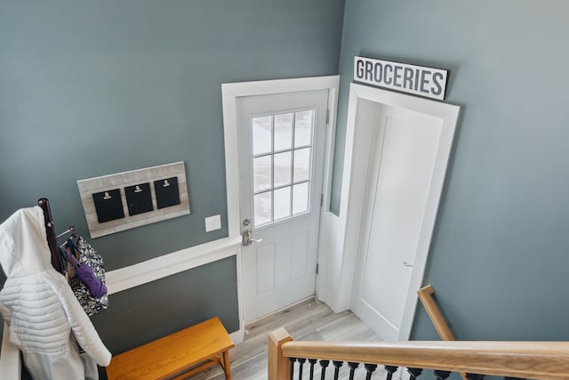 doorway with light hardwood / wood-style flooring