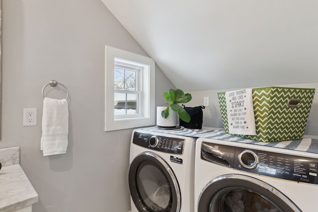 washroom with washer and clothes dryer