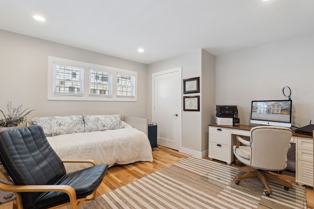 bedroom featuring light wood-type flooring