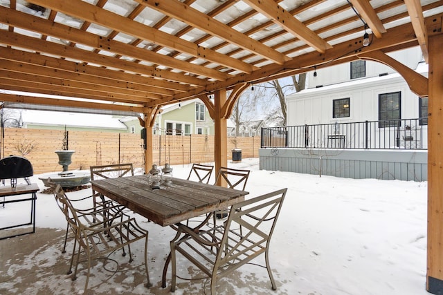 view of snow covered patio