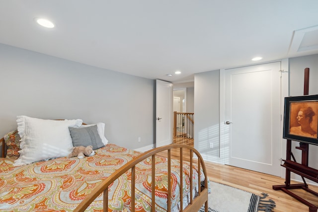 bedroom featuring hardwood / wood-style floors