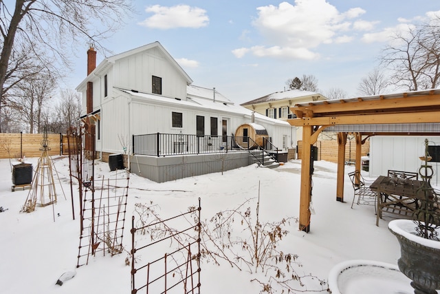 view of snow covered house