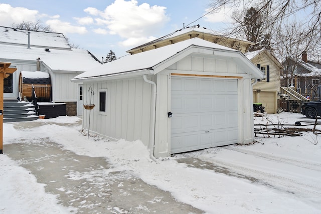 view of snow covered garage