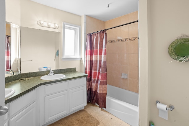 bathroom featuring vanity, tile patterned flooring, and shower / bath combo