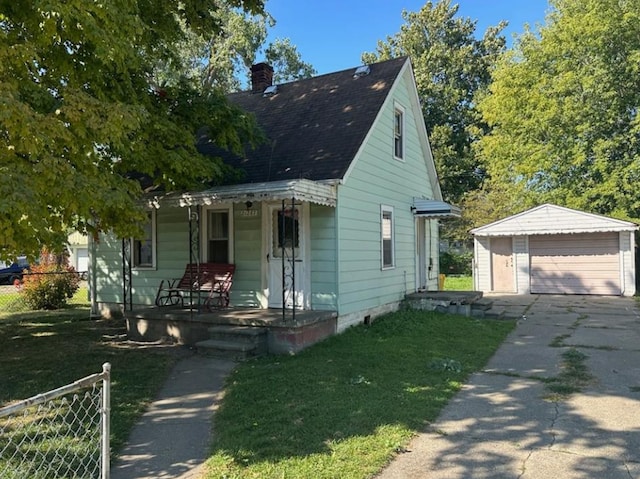 view of front of house featuring an outdoor structure, fence, covered porch, and a chimney