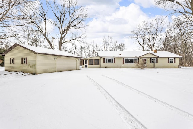 ranch-style home with a garage