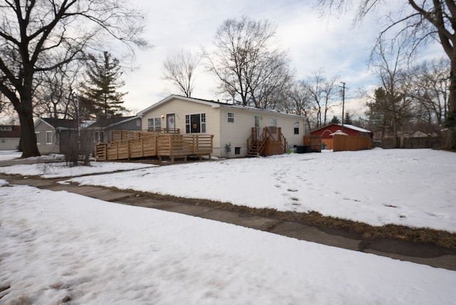 view of snow covered property