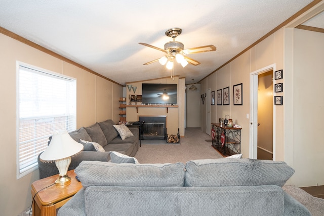 living room with crown molding, light carpet, and ceiling fan