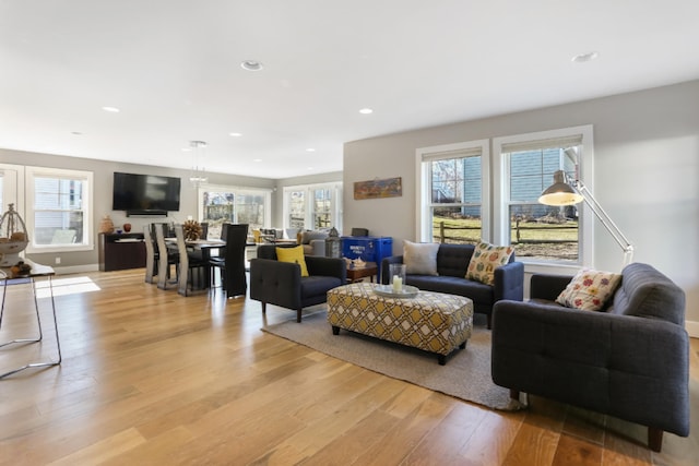 living room with light hardwood / wood-style flooring