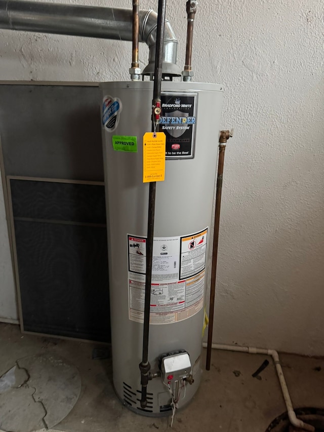 utility room with water heater