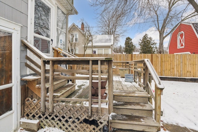 view of snow covered deck