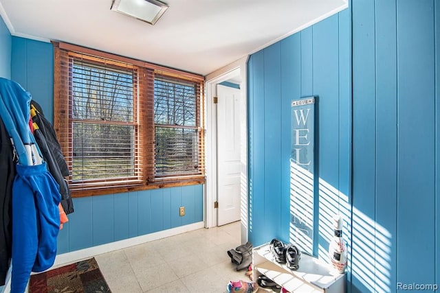 interior space with crown molding