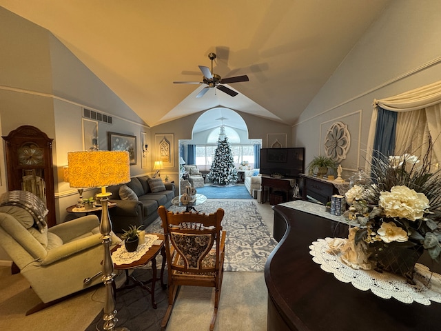 carpeted living room featuring lofted ceiling and ceiling fan