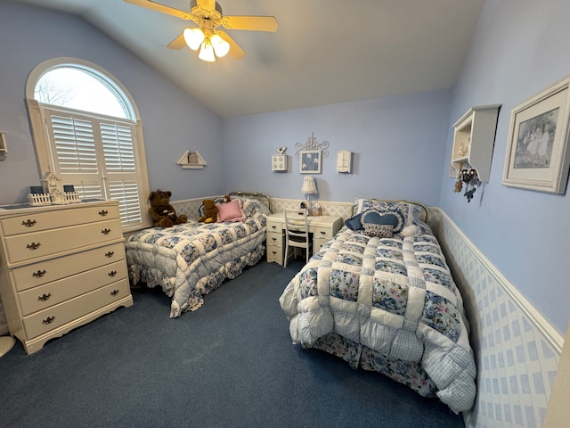 bedroom with carpet floors, vaulted ceiling, and ceiling fan