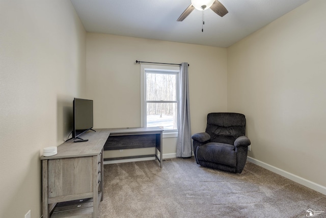 sitting room featuring ceiling fan and light carpet